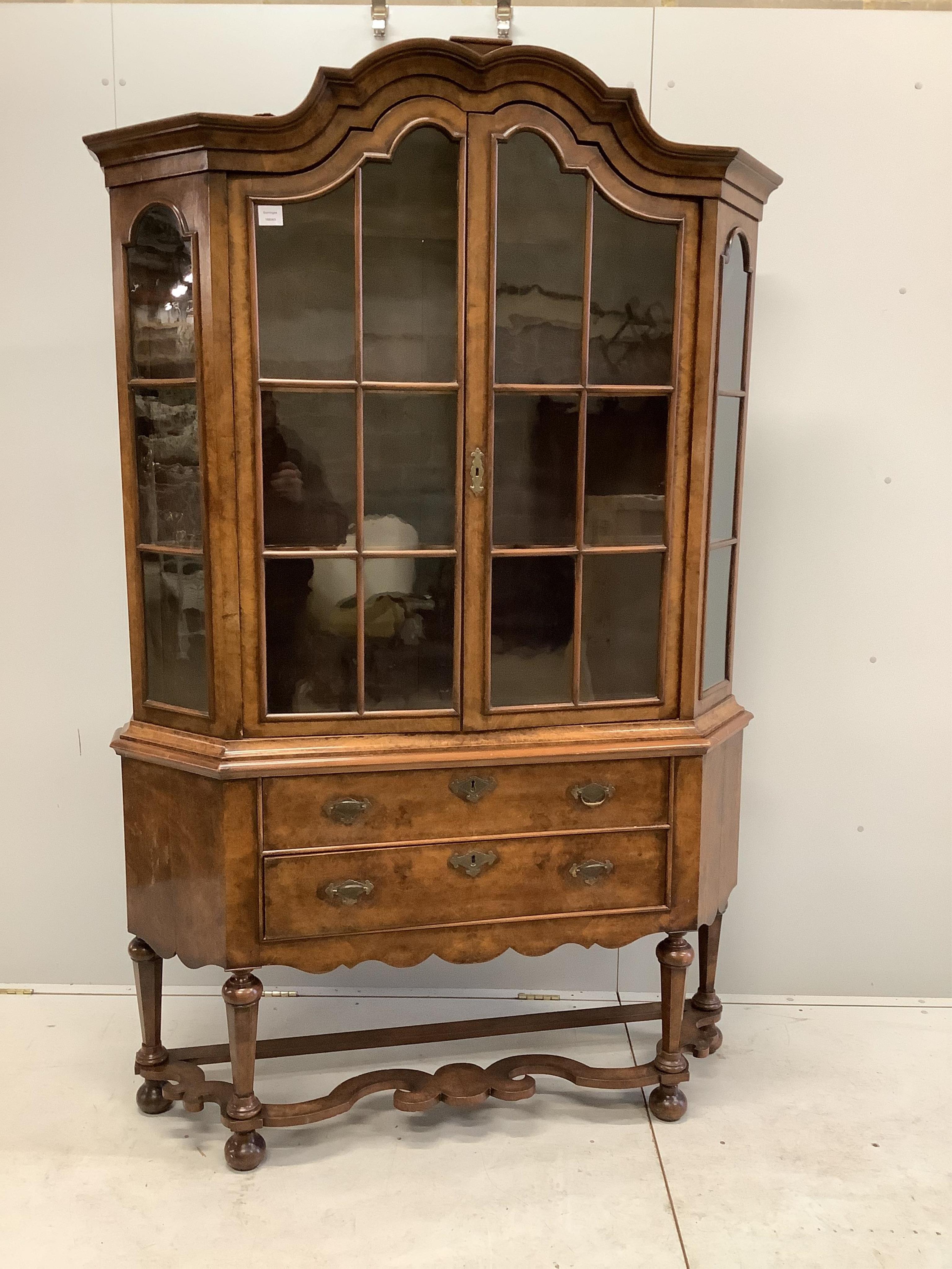 An 18th century style Dutch walnut display cabinet, width 136cm, depth 33cm, height 208cm. Condition - fair to good